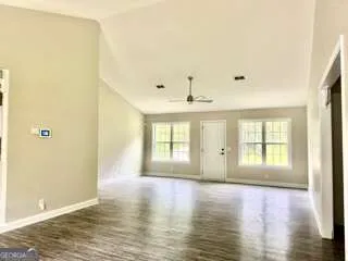 a view of an empty room with window