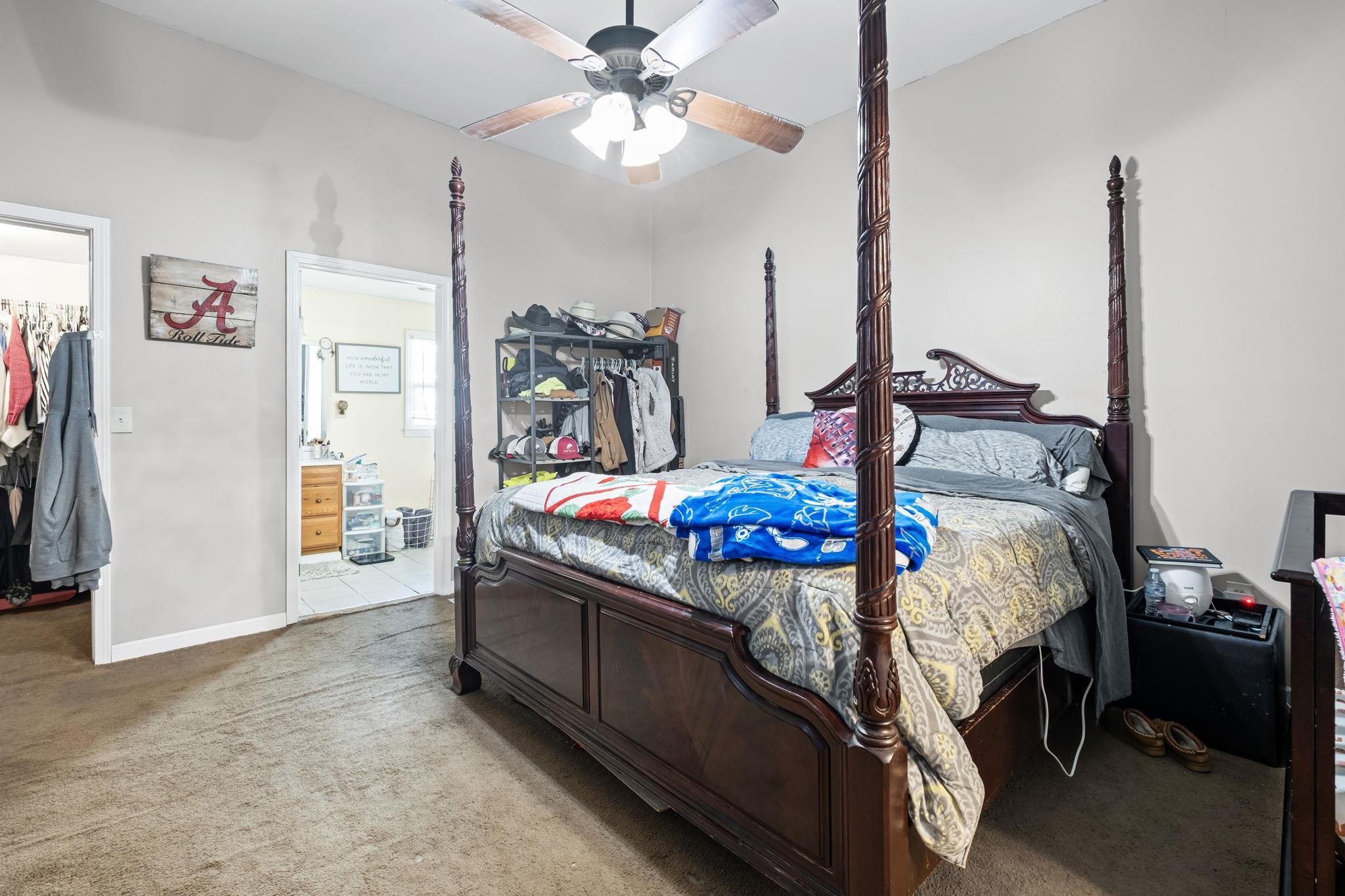 301 North Maple Street Covington, TN 38019 - Photo 12 of 26 a bed room with a bed