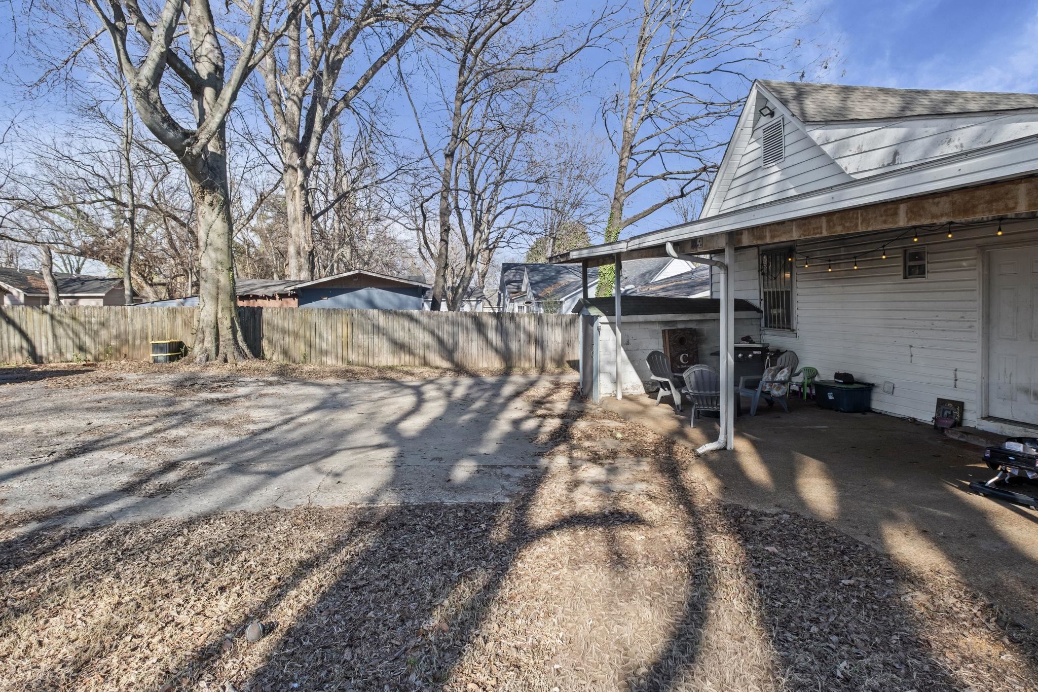 301 North Maple Street Covington, TN 38019 - Photo 22 of 26 a view of a yard with trees