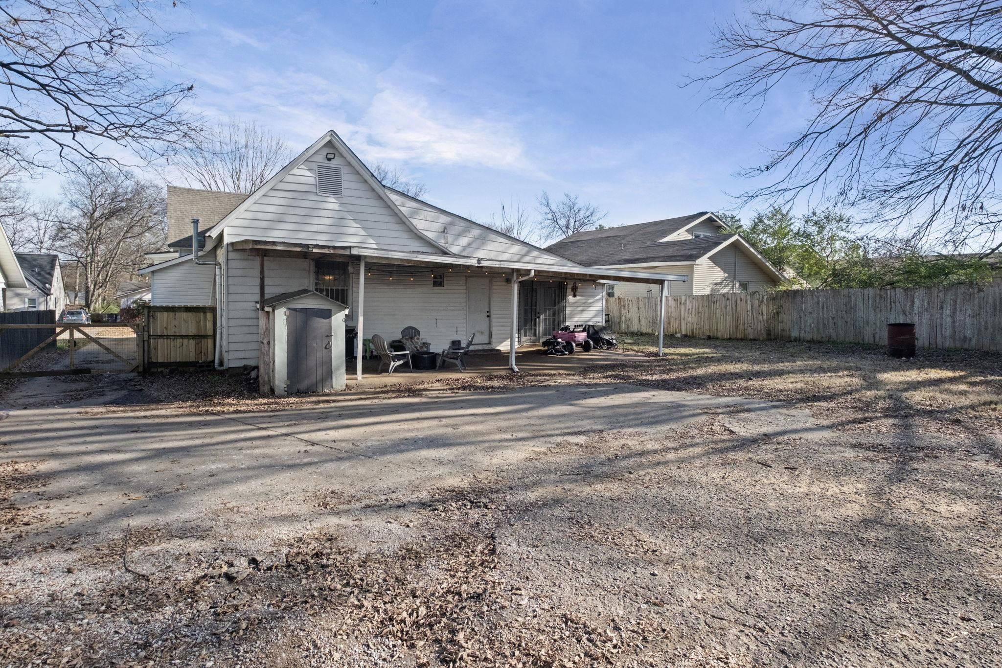 301 North Maple Street Covington, TN 38019 - Photo 23 of 26 a view of a yard in front of a house
