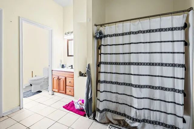 a bathroom with a sink and a shower