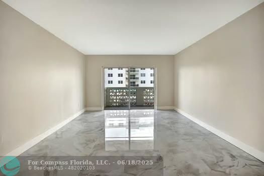 1901 South Ocean Drive, Unit 202 Hollywood, FL 33019 - Photo 7 of 11 a view of an empty room and window