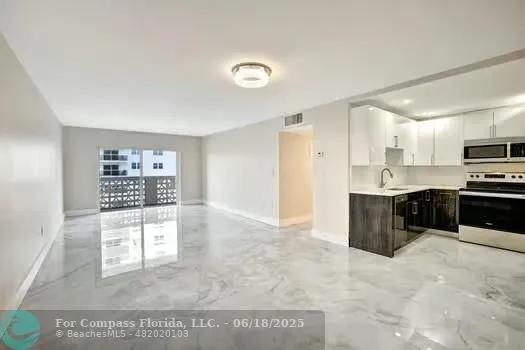 a bathroom with a sink toilet and mirror