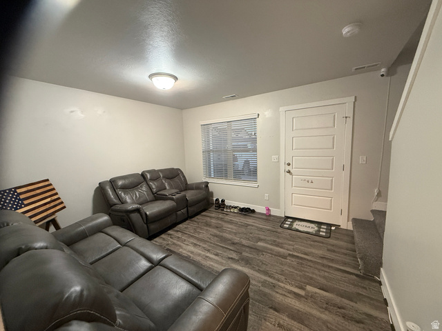 485 370 South Preston, ID 83263 - Photo 5 of 16 Living room with dark wood finished floors and baseboards