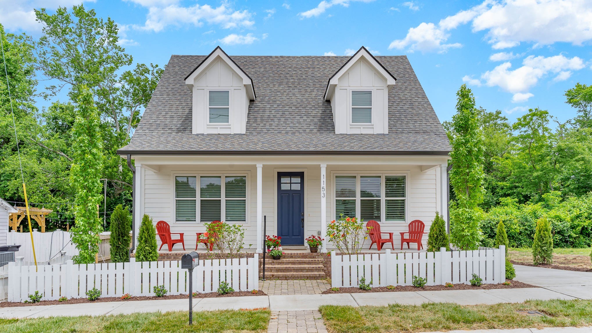 1153 Carter Street Franklin, TN 37064 - Photo 1 of 24 front view of a house with a yard