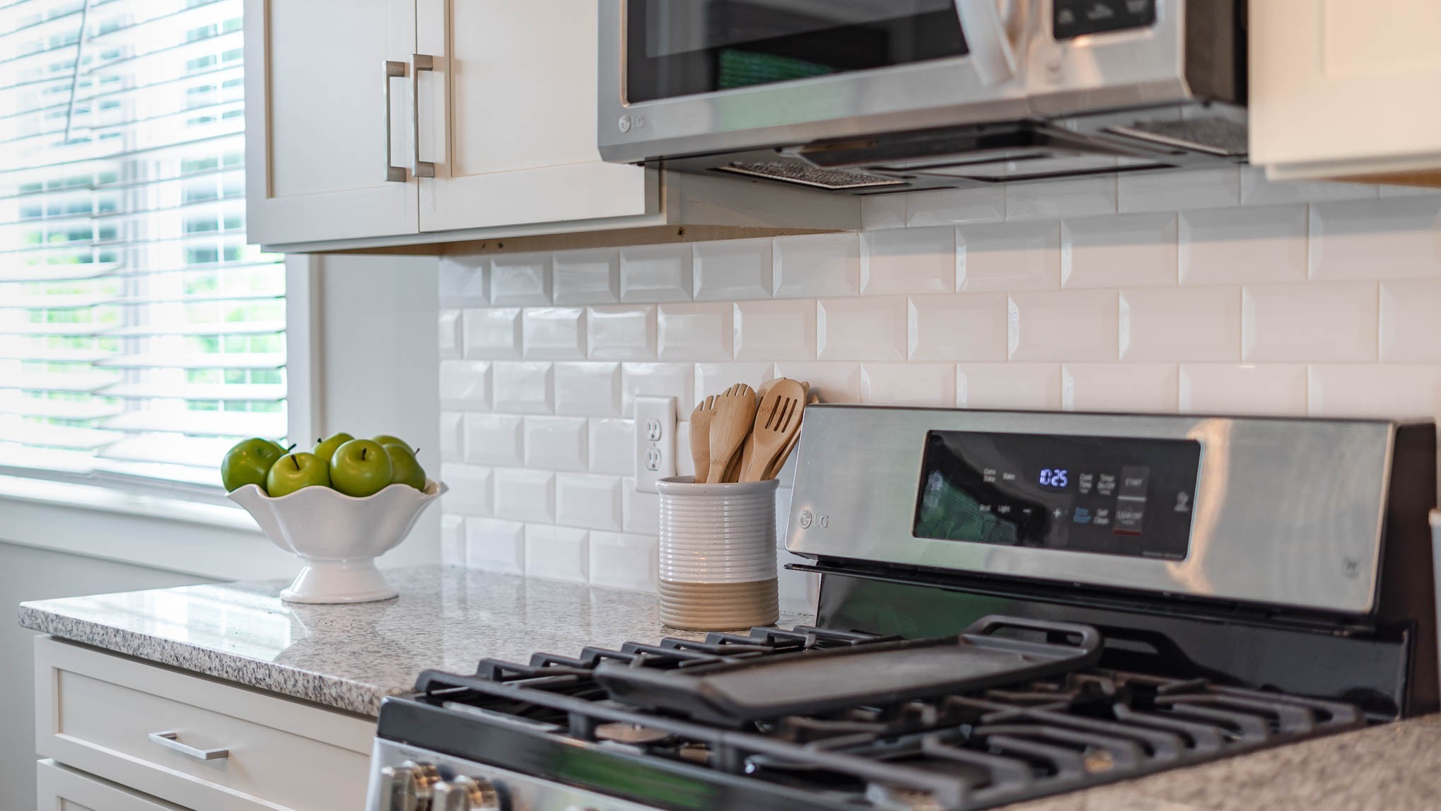 1153 Carter Street Franklin, TN 37064 - Photo 21 of 24 a stove top oven sitting inside of a kitchen
