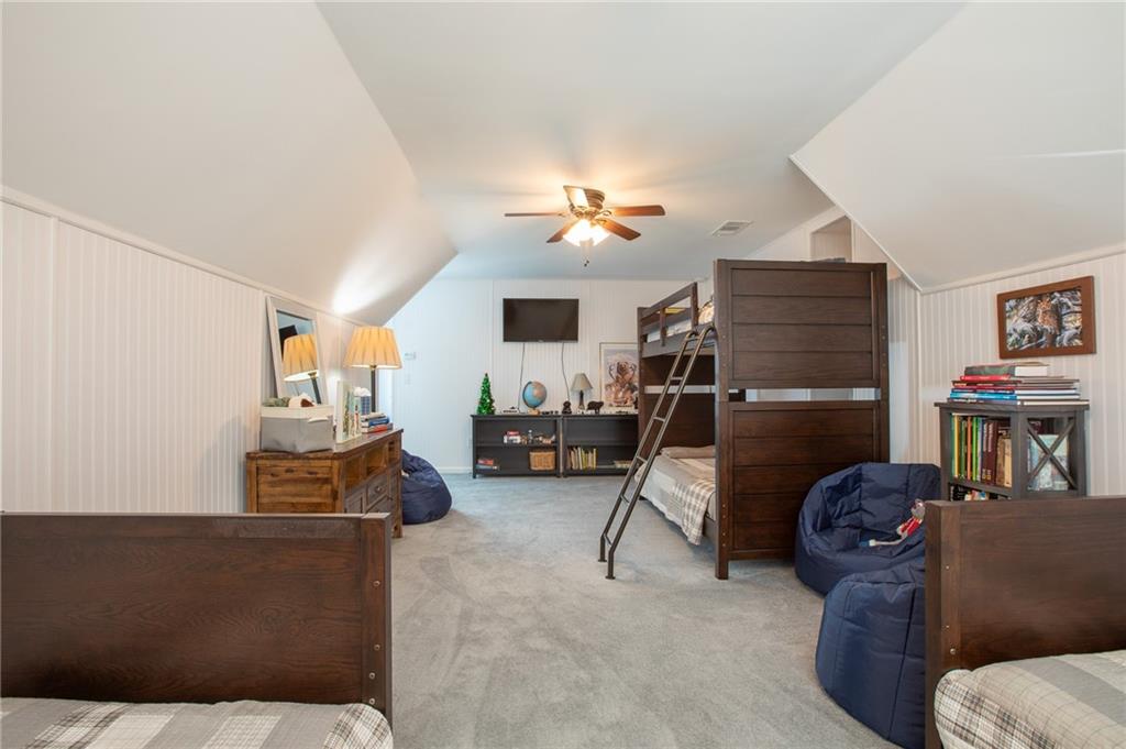 4014 Lavender Point Southwest Gainesville, GA 30504 - Photo 11 of 14 a living room with furniture and a flat screen tv