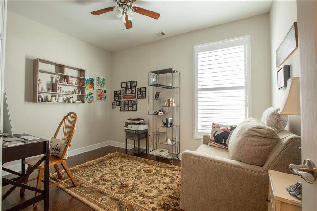 4014 Lavender Point Southwest Gainesville, GA 30504 - Photo 8 of 14 a living room with furniture and a rug