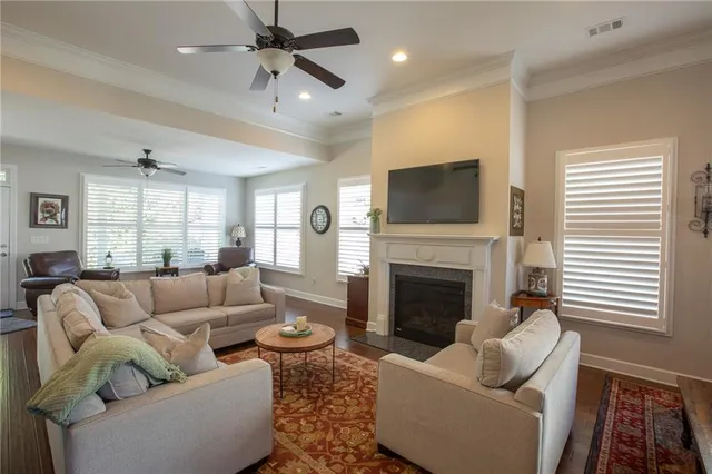 a bedroom with furniture and a chandelier