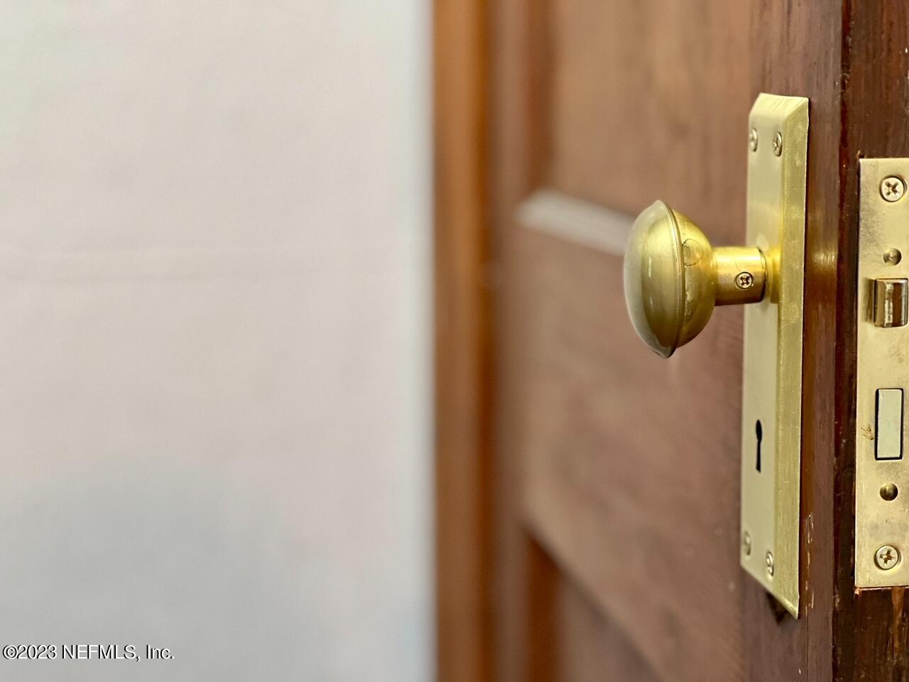 902 Nelson Street Jacksonville, FL 32205 - Photo 8 of 13 a close view of door lock