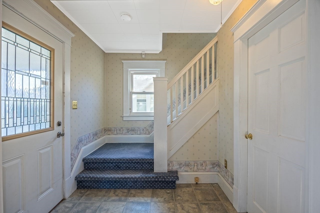 450 East Street Chicopee, MA 01020 - Photo 17 of 38 a view of staircase with white walls and windows