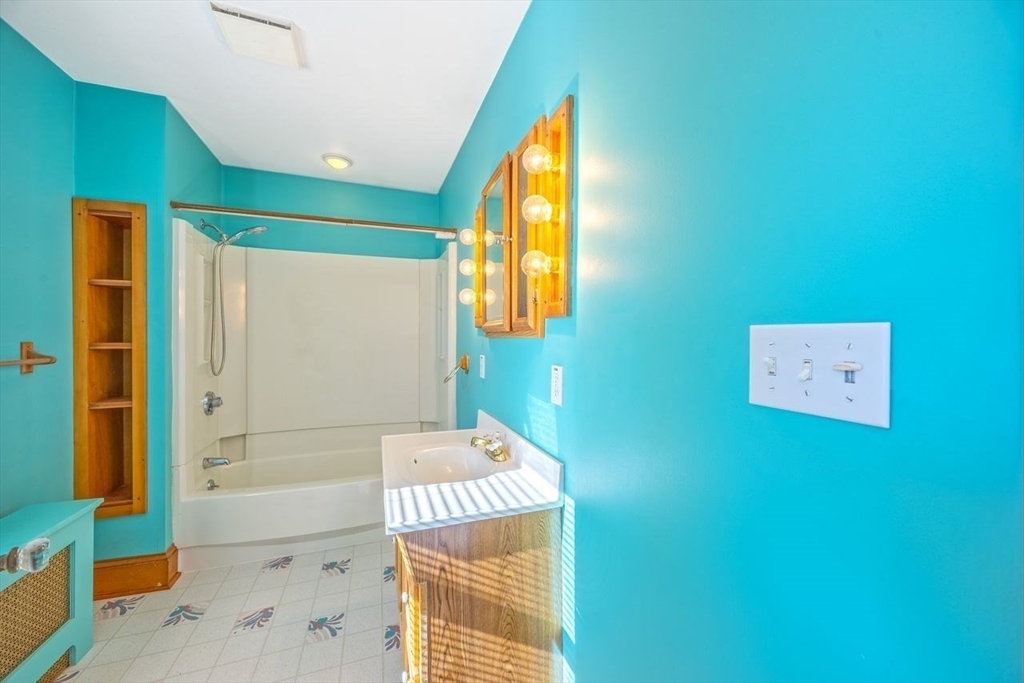 450 East Street Chicopee, MA 01020 - Photo 27 of 38 a bathroom with a bathtub and shower