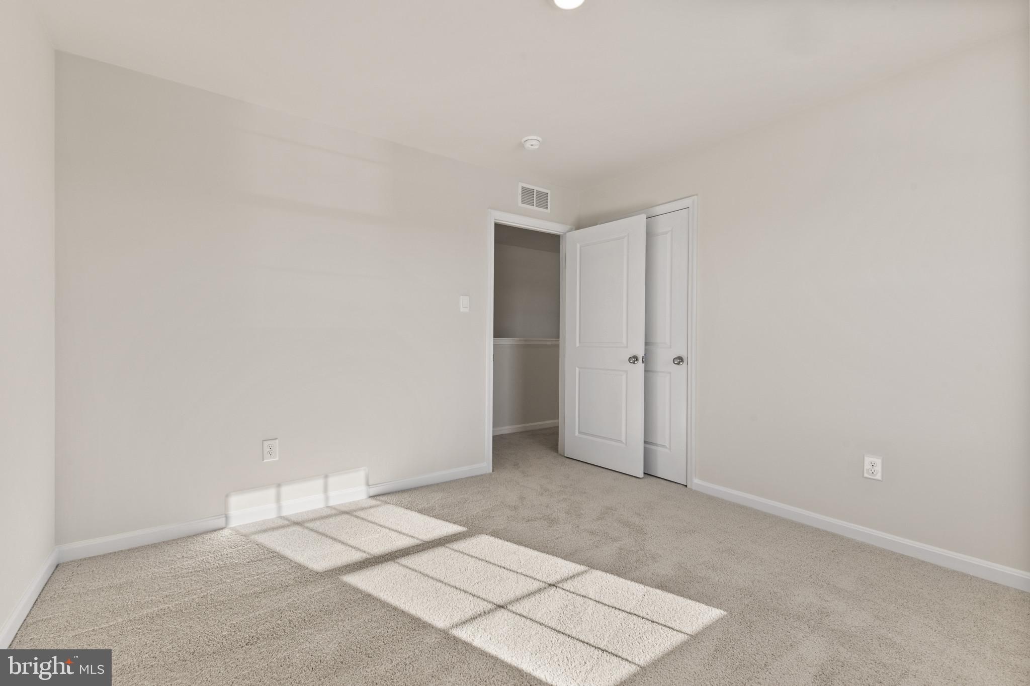 598 Atkinson Street Charles Town, WV 25414 - Photo 16 of 31 an empty room with an entryway