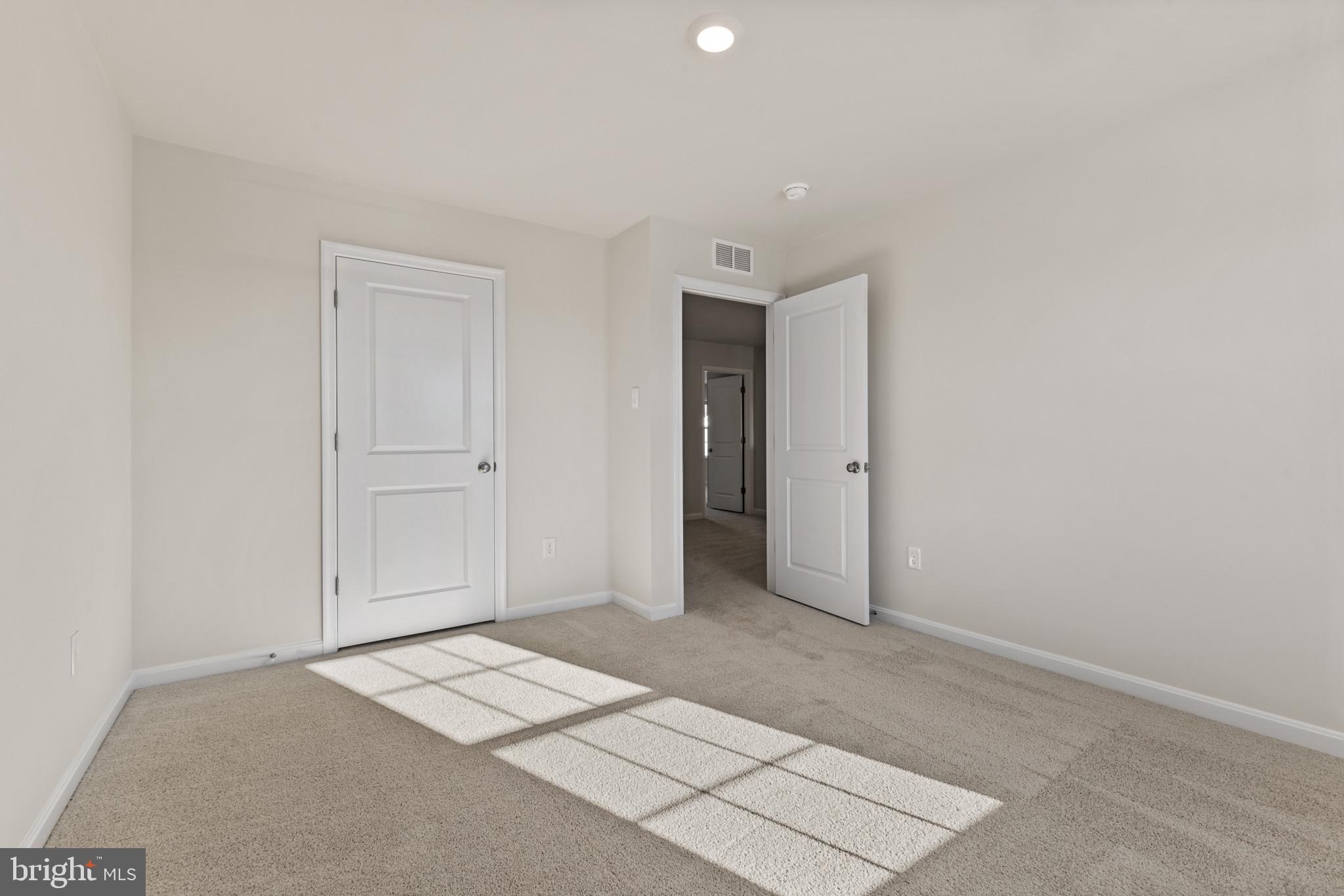 598 Atkinson Street Charles Town, WV 25414 - Photo 18 of 31 an empty room with an entryway