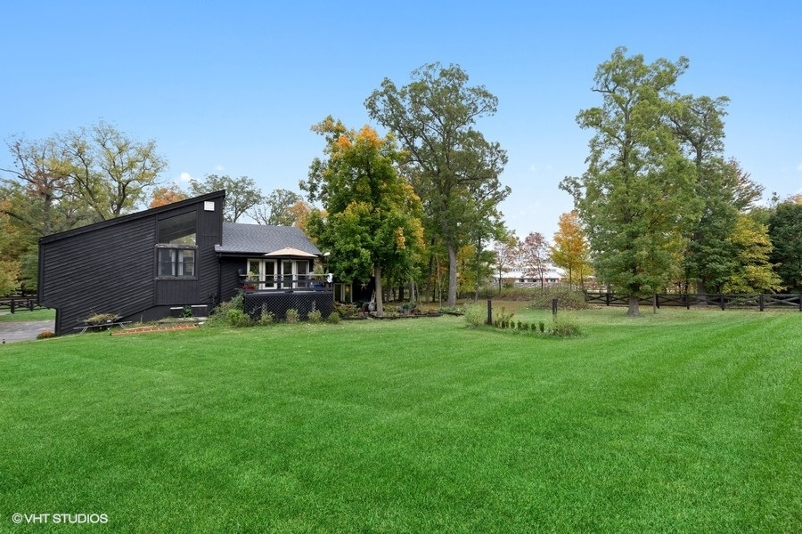 15141 West Little St Marys Road Mettawa, IL 60048 - Photo 39 of 42 a view of a house with a backyard