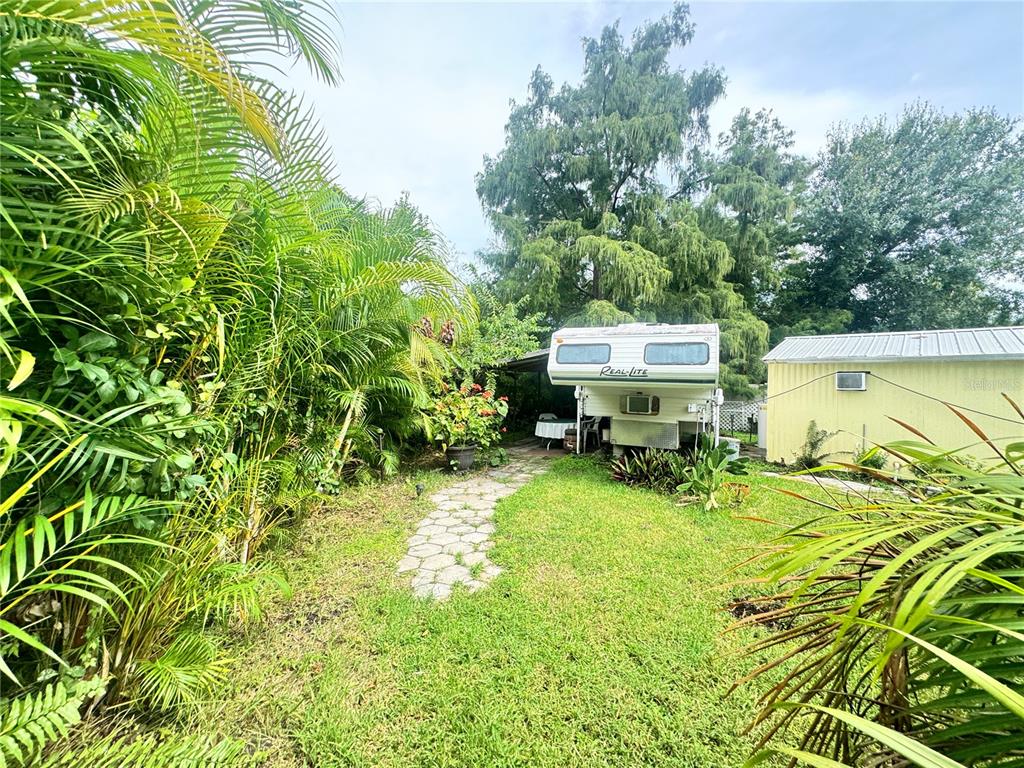 11970 Southwest Loop Terrace Arcadia, FL 34269 - Photo 25 of 37 a view of a backyard with swimming pool