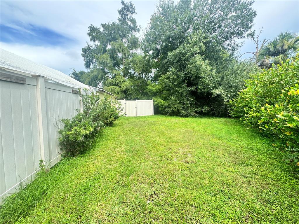 11970 Southwest Loop Terrace Arcadia, FL 34269 - Photo 8 of 37 a view of a backyard with garden