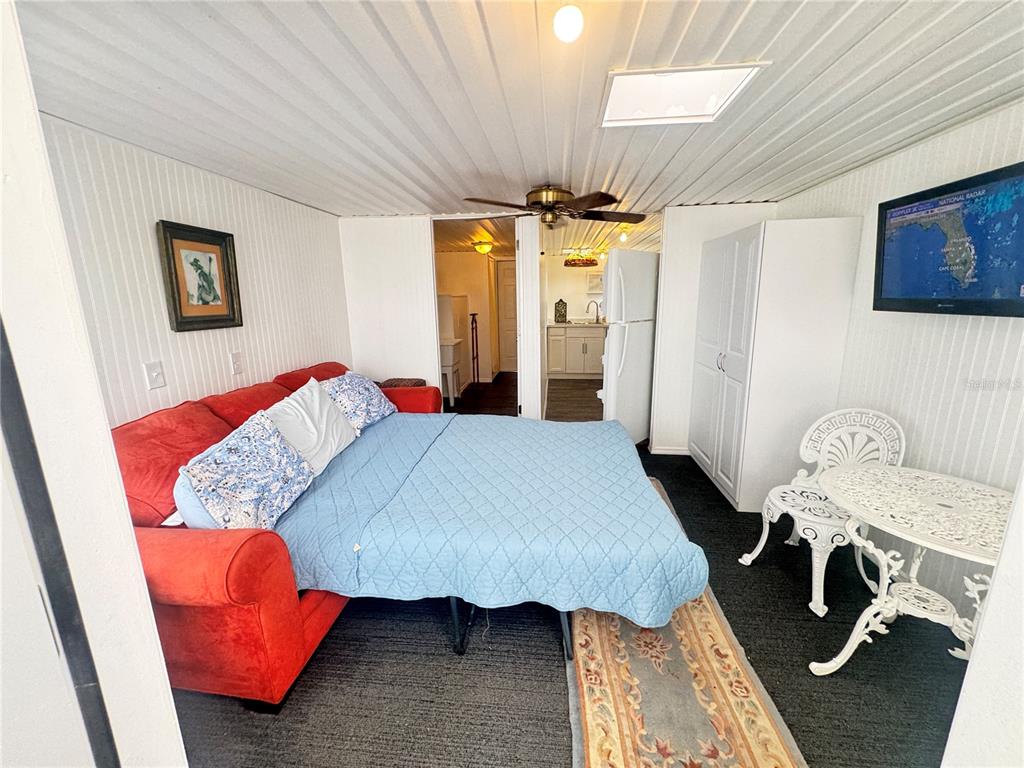 11970 Southwest Loop Terrace Arcadia, FL 34269 - Photo 10 of 37 a bed room with a bed and a chair