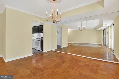 a view of a livingroom with a kitchen