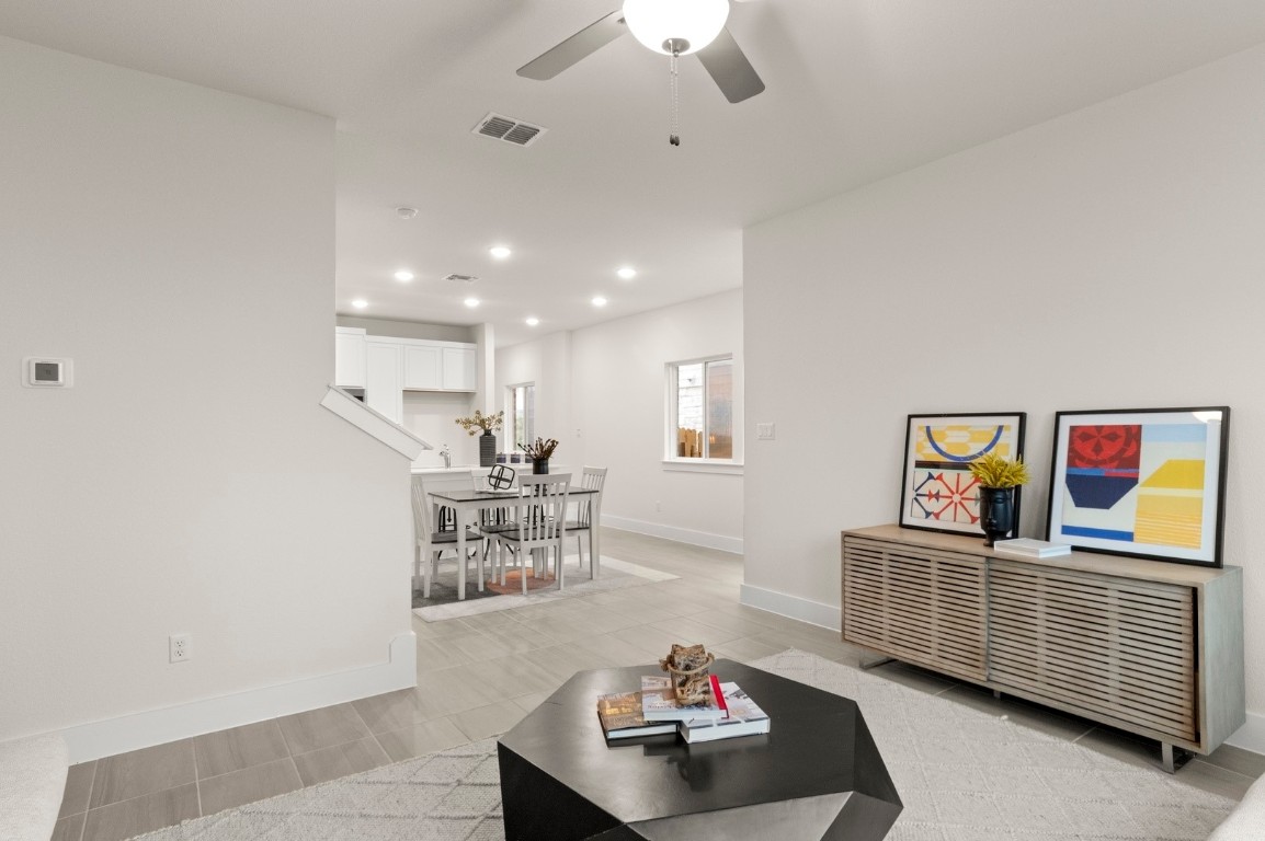 701 White Steppe Way Georgetown, TX 78626 - Photo 18 of 35 Living area with recessed lighting and ceiling fan