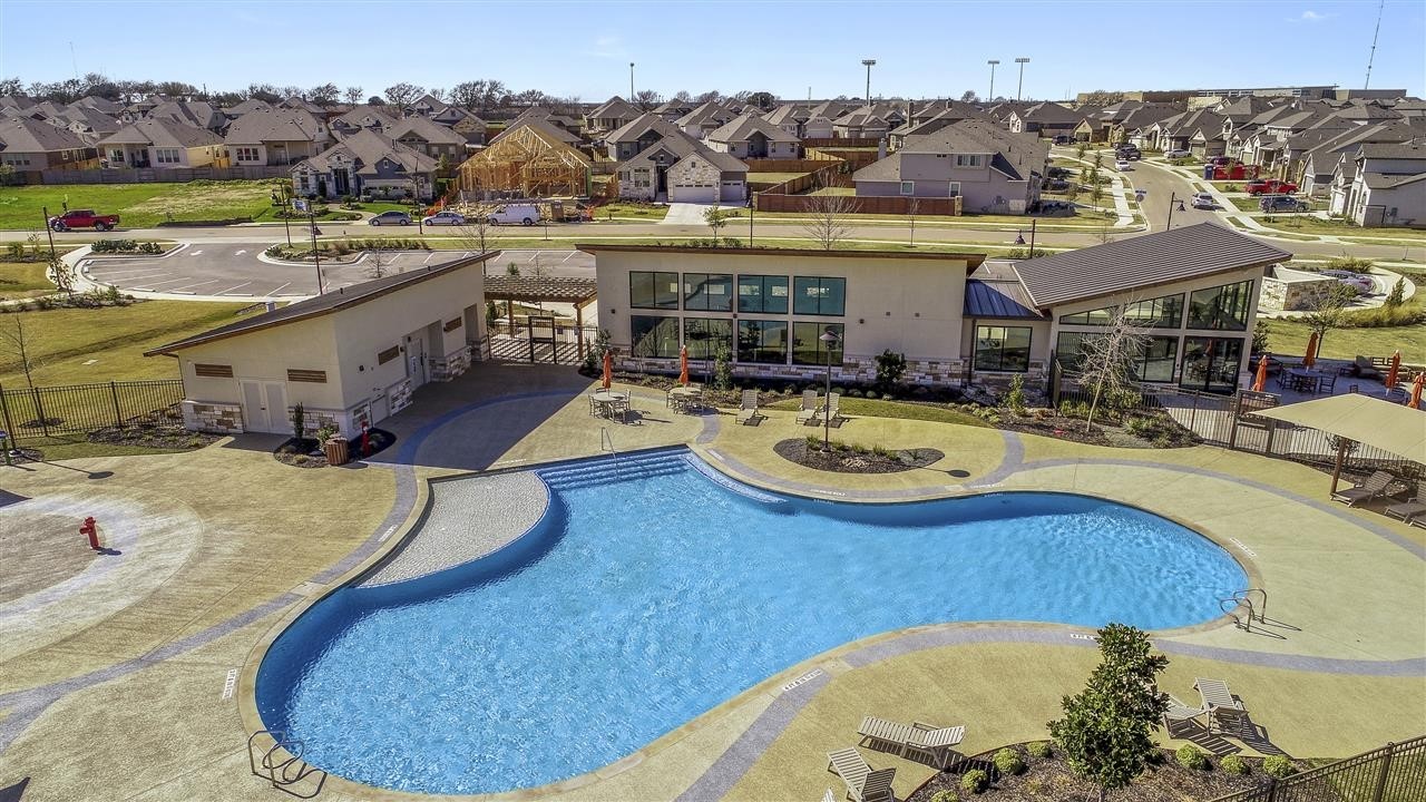 701 White Steppe Way Georgetown, TX 78626 - Photo 29 of 35 Community pool with a residential view and a patio area