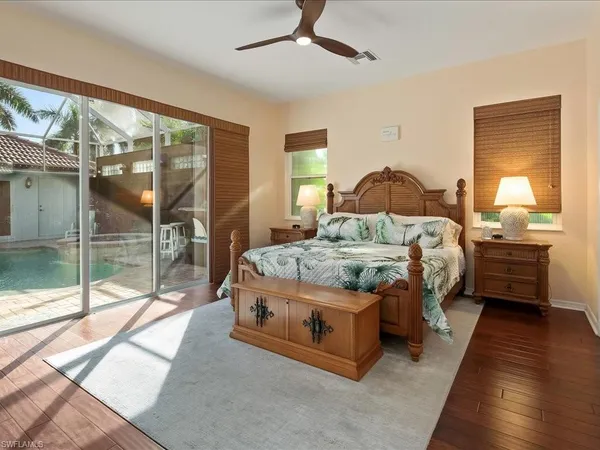 a bedroom with a bed and a walk in closet