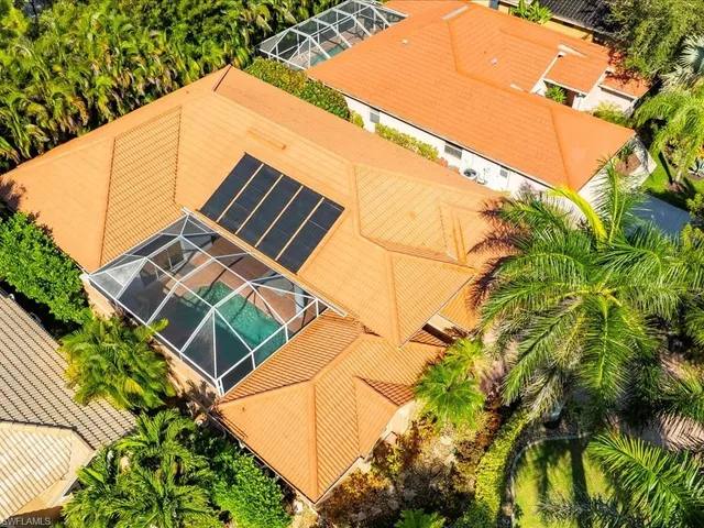 a view of a yard with swimming pool