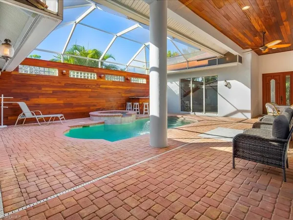 a view of a lounge chairs in a patio