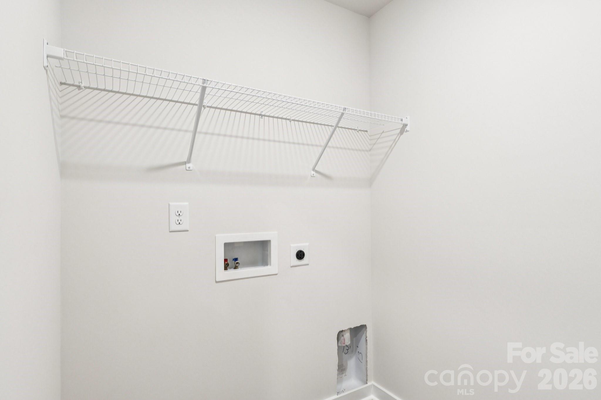 569 North Sparkleberry Street Chester, SC 29706 - Photo 16 of 40 a view of a room with racks on the wall