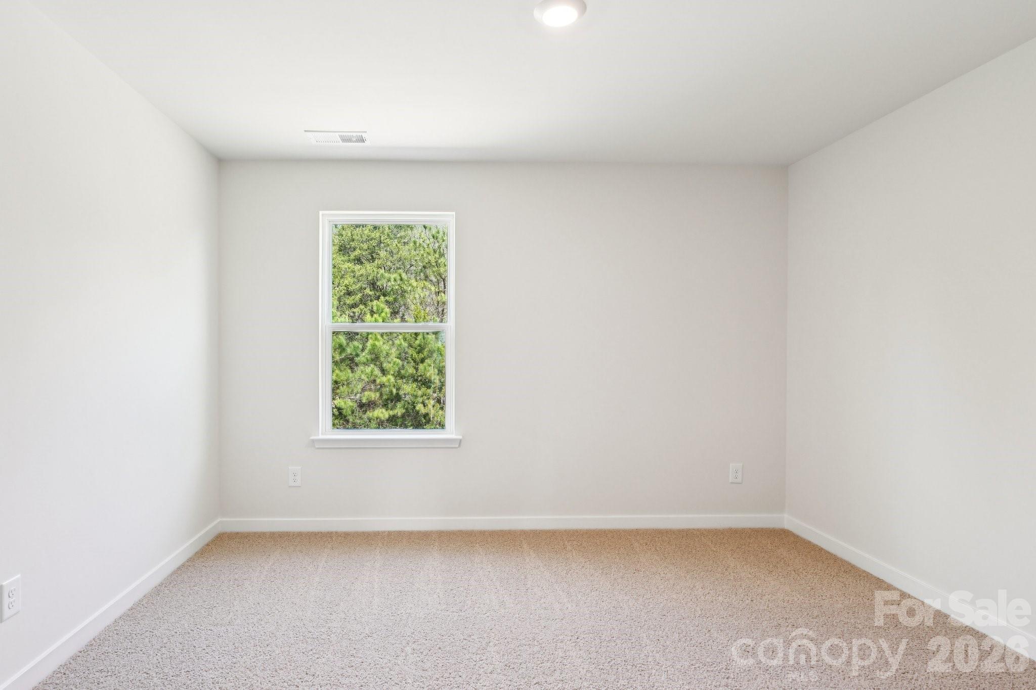 569 North Sparkleberry Street Chester, SC 29706 - Photo 17 of 40 an empty room with a window