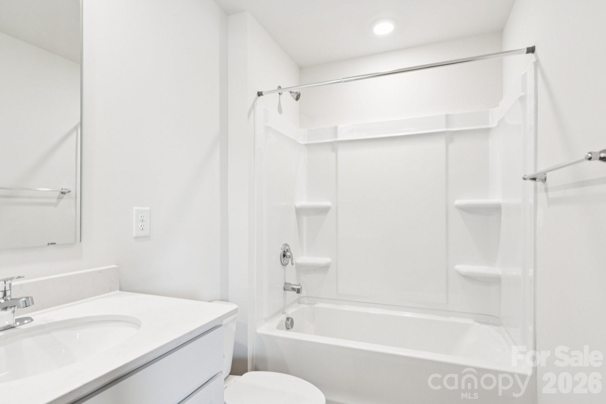 569 North Sparkleberry Street Chester, SC 29706 - Photo 22 of 40 a bathroom with a bathtub shower sink vanity and toilet