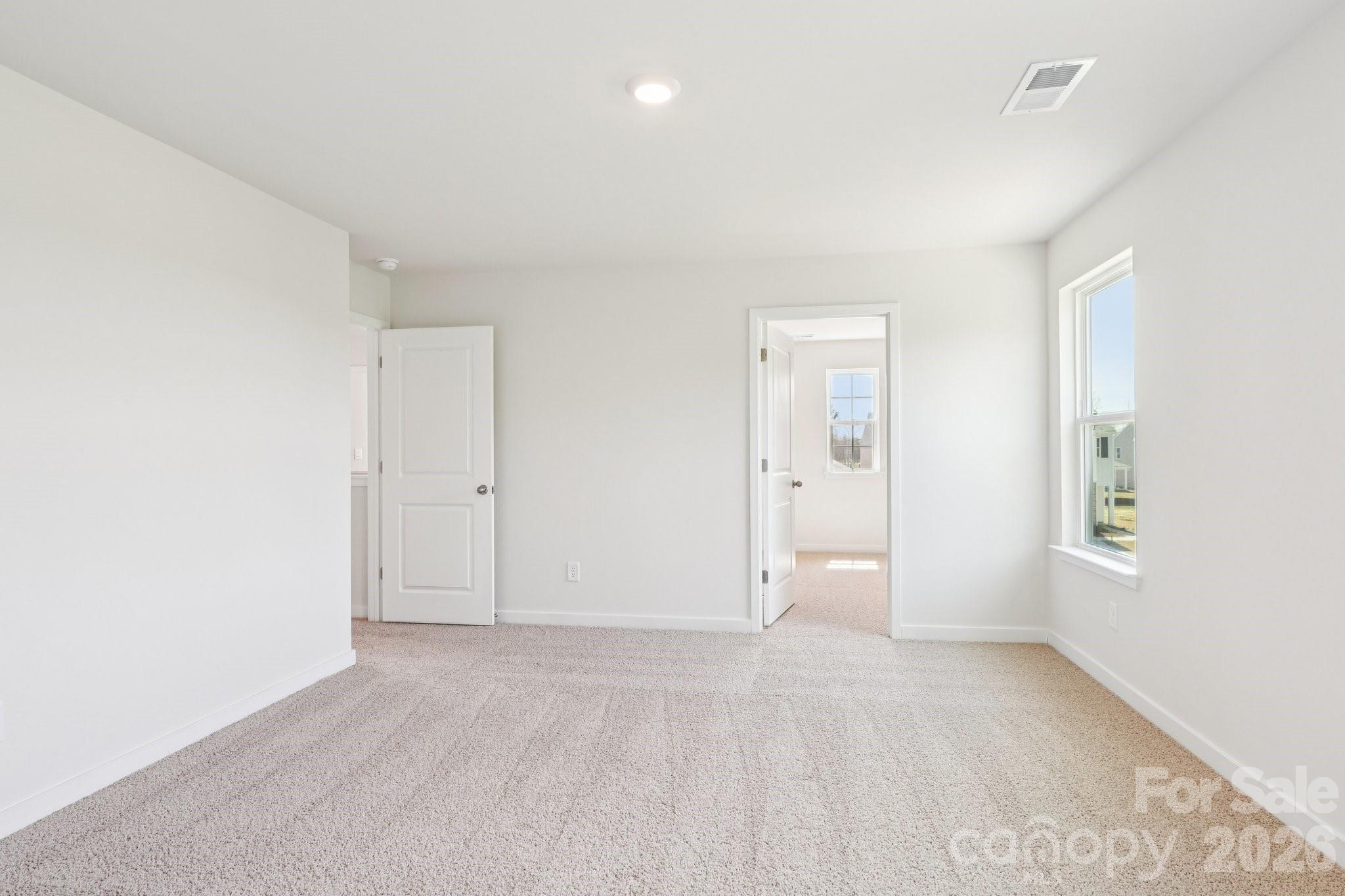 569 North Sparkleberry Street Chester, SC 29706 - Photo 26 of 40 an empty room with windows and closet