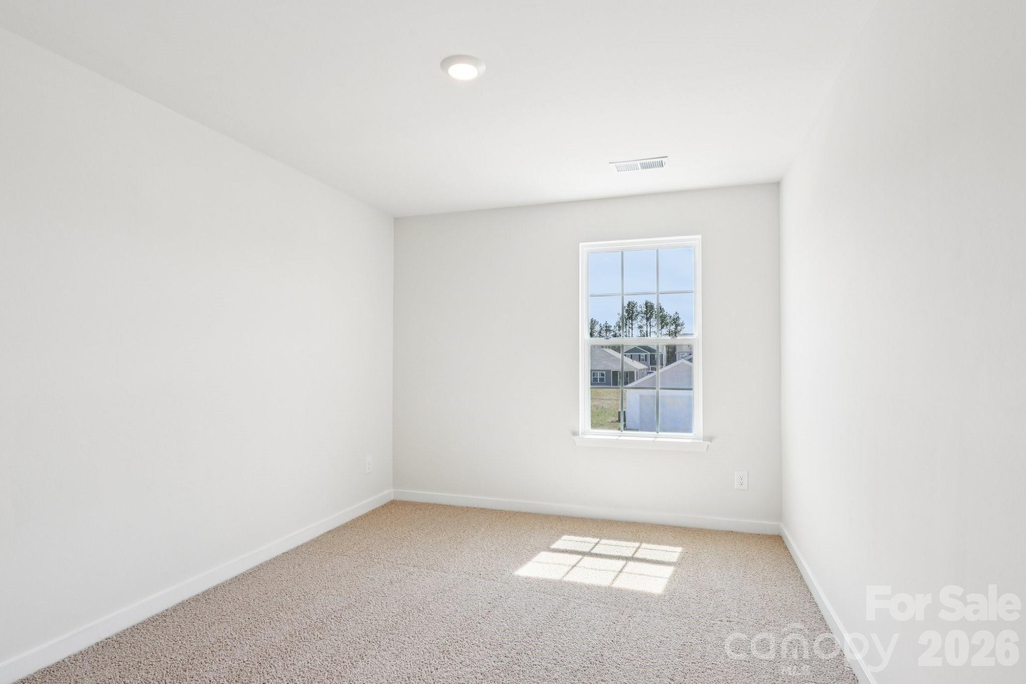 569 North Sparkleberry Street Chester, SC 29706 - Photo 31 of 40 an empty room with windows