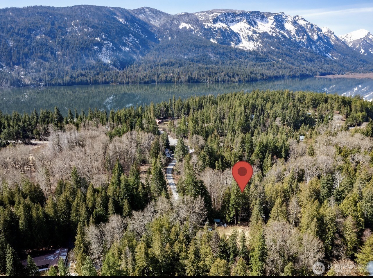 22740 Brown Road Leavenworth, WA 98826 - Photo 2 of 21 a view of a lake with a mountain and a forest