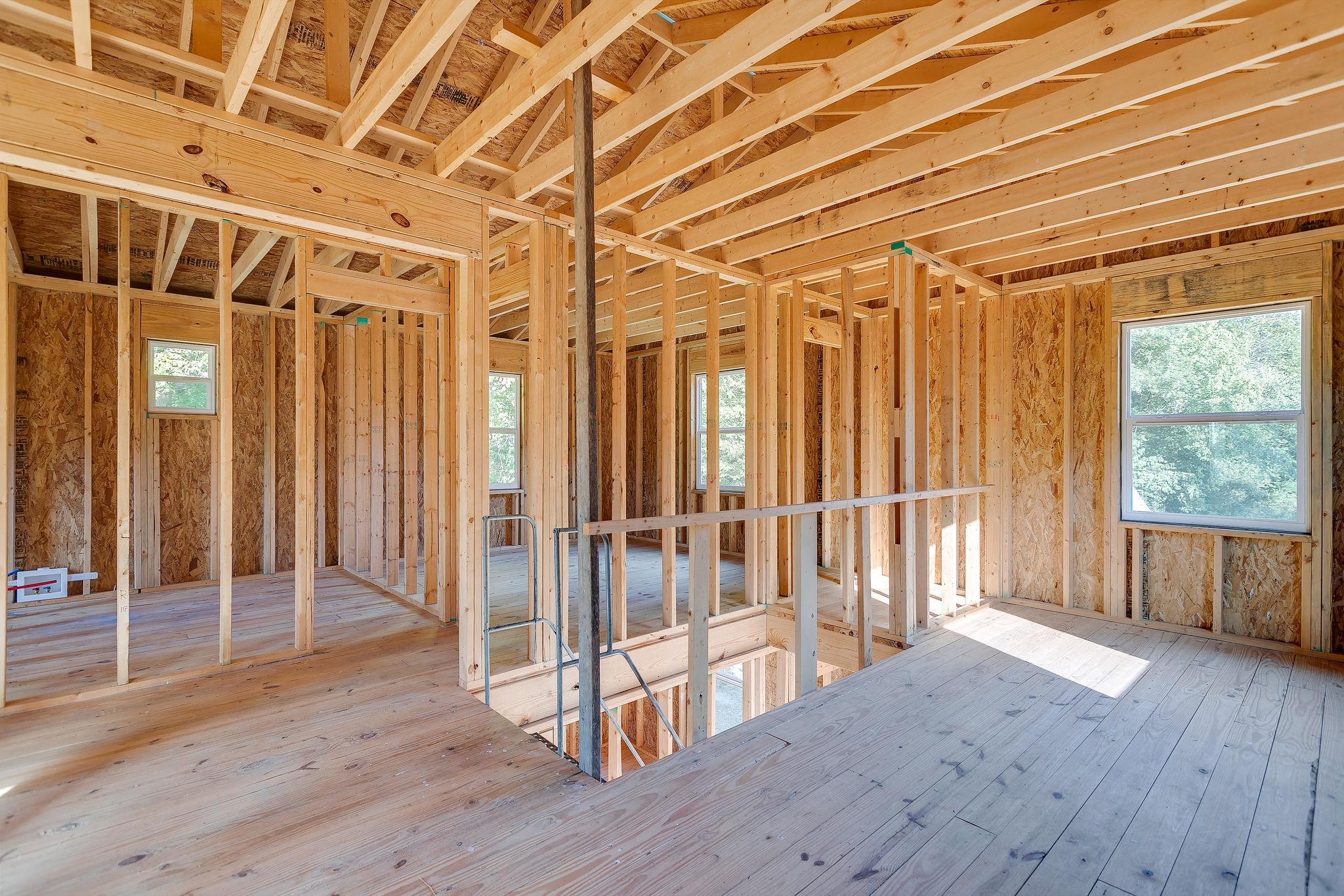 6572 Hassell Creek Road Lyles, TN 37098 - Photo 12 of 29 an empty room with wooden floor and windows