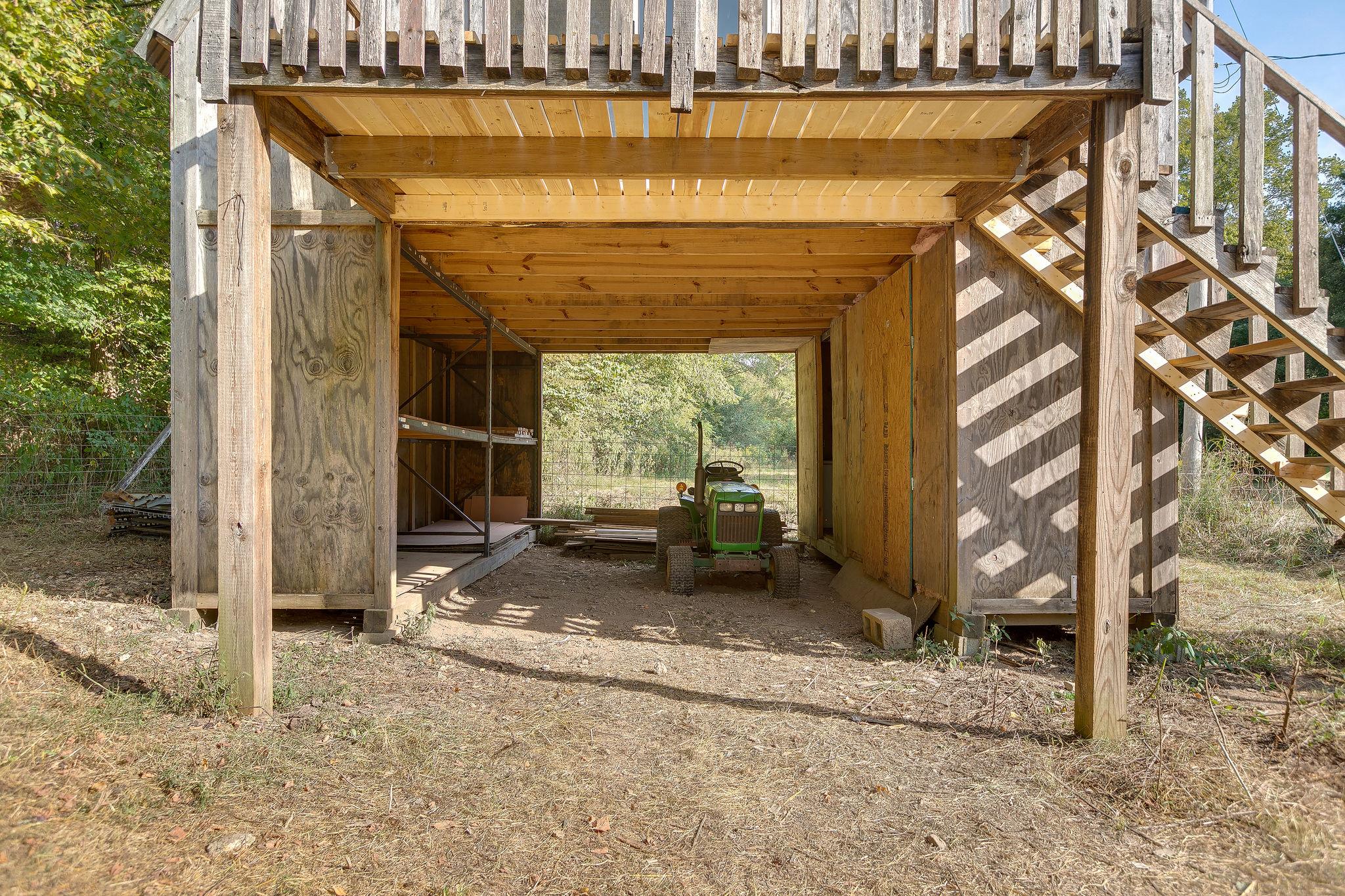 6572 Hassell Creek Road Lyles, TN 37098 - Photo 14 of 29 a view of a room with a large window and wooden fence