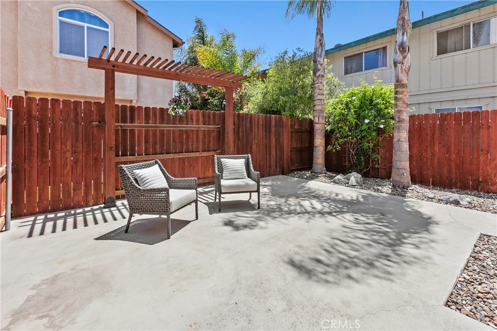 263 Spruce Street, Unit B Arroyo Grande, CA 93420 - Photo 18 of 36 a view of a chairs with two chairs in patio