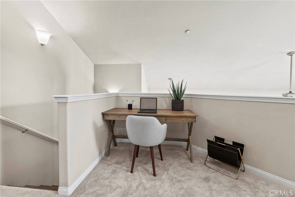263 Spruce Street, Unit B Arroyo Grande, CA 93420 - Photo 22 of 36 a living room with furniture and a potted plant