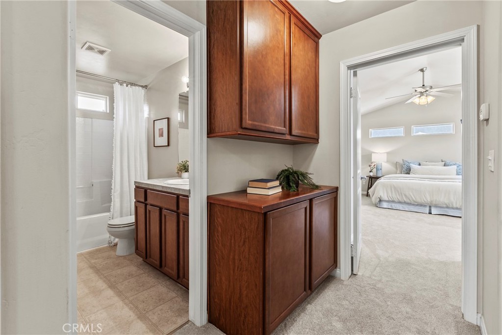 263 Spruce Street, Unit B Arroyo Grande, CA 93420 - Photo 23 of 36 a utility room with granite countertop a sink and a refrigerator