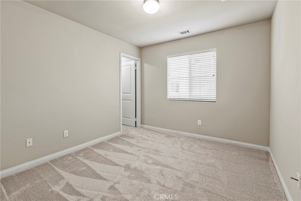 263 Spruce Street, Unit B Arroyo Grande, CA 93420 - Photo 32 of 36 a view of an empty room with a window