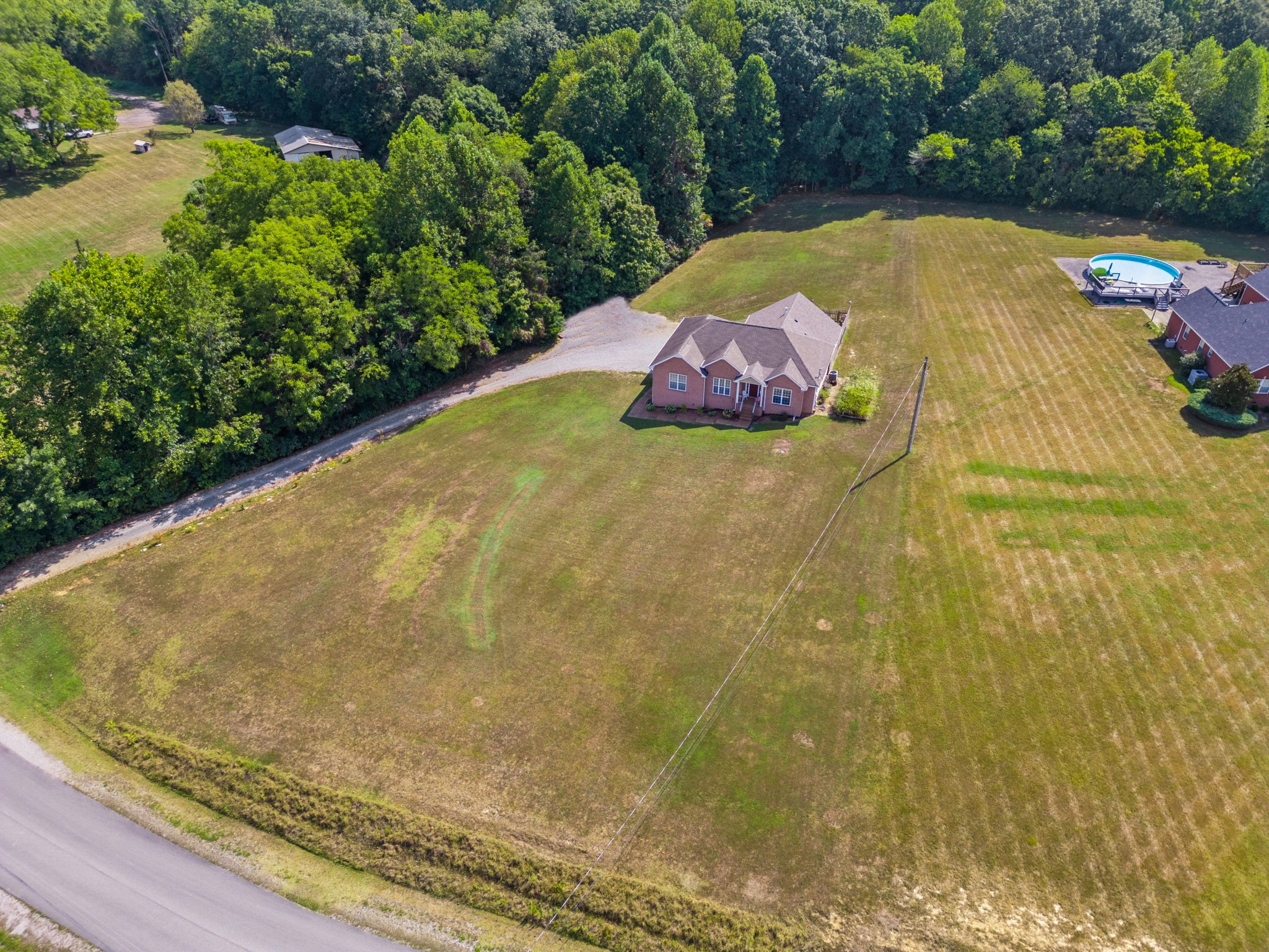 1051 Jacob's Valley Road Joelton, TN 37080 - Photo 38 of 45 a view of a swimming pool with a yard