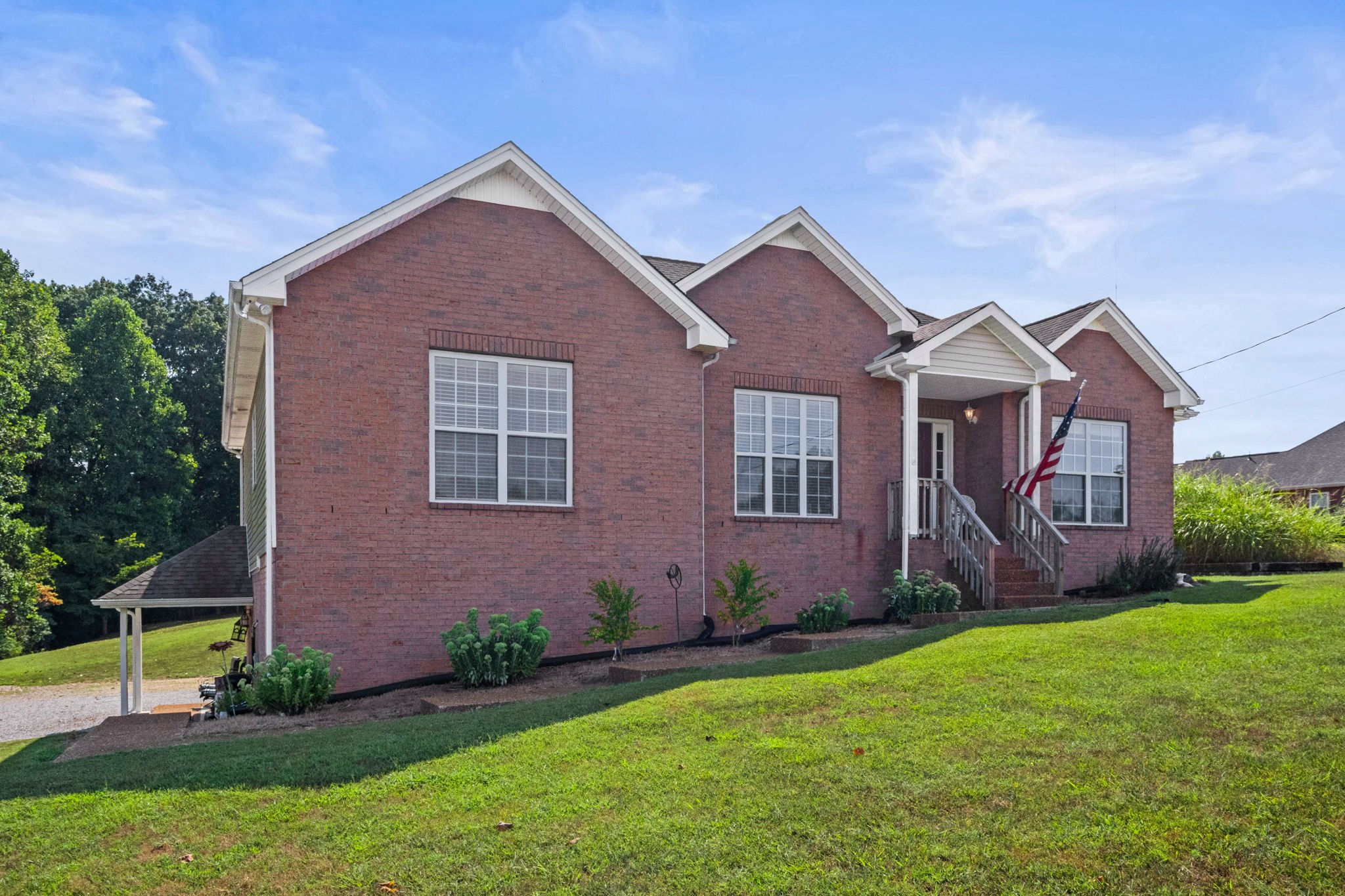 1051 Jacob's Valley Road Joelton, TN 37080 - Photo 43 of 45 a front view of a house with garden