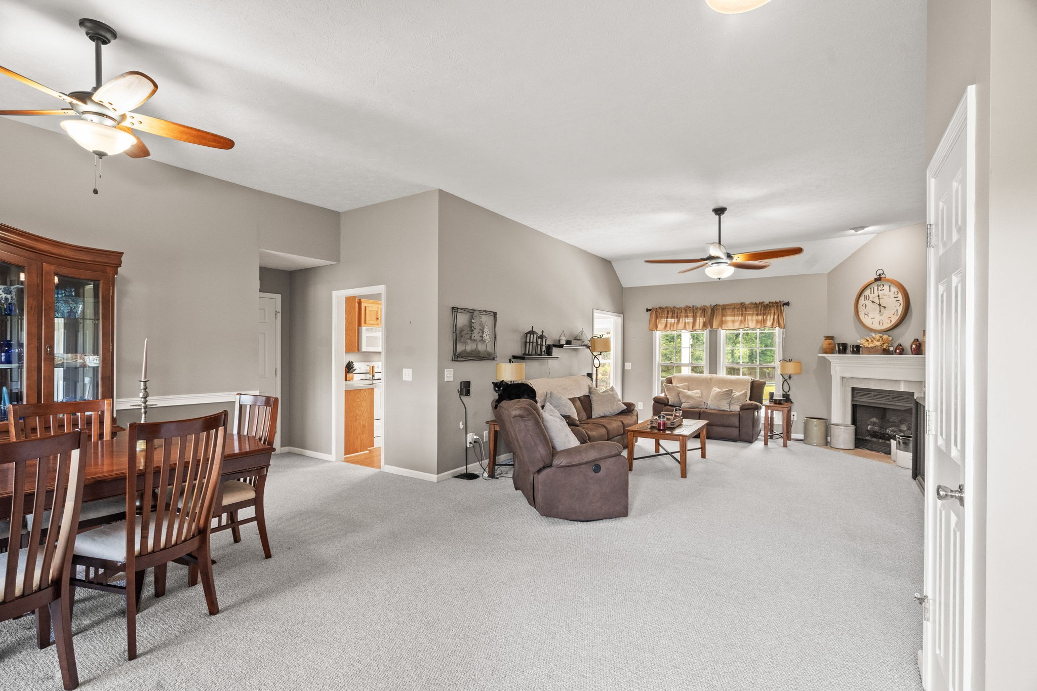 1051 Jacob's Valley Road Joelton, TN 37080 - Photo 6 of 45 a living room with furniture a fireplace and a chandelier