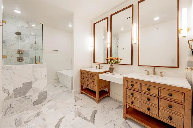 a dining room with furniture and a chandelier