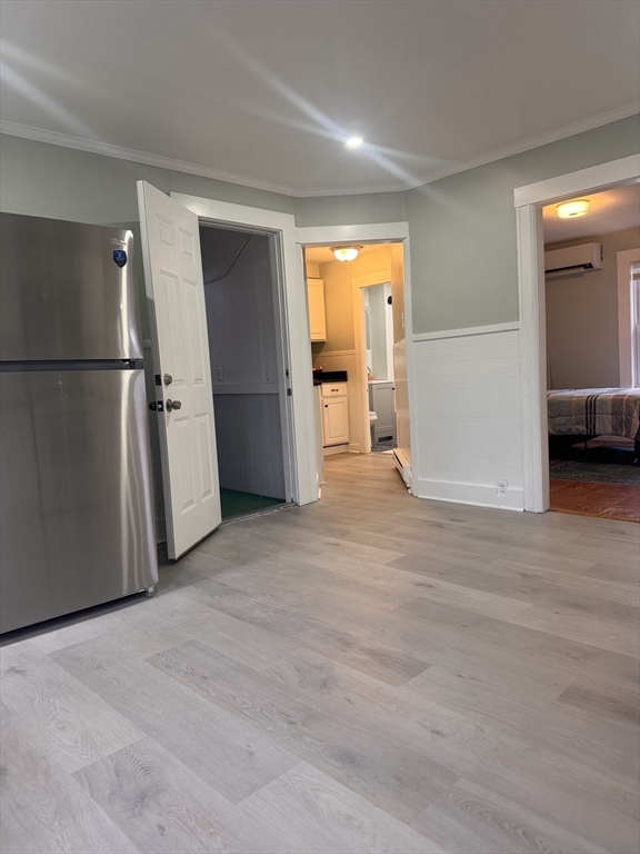 18 Emerald Avenue, Unit 2 Webster, MA 01570 - Photo 16 of 26 a view of empty room with wooden floor