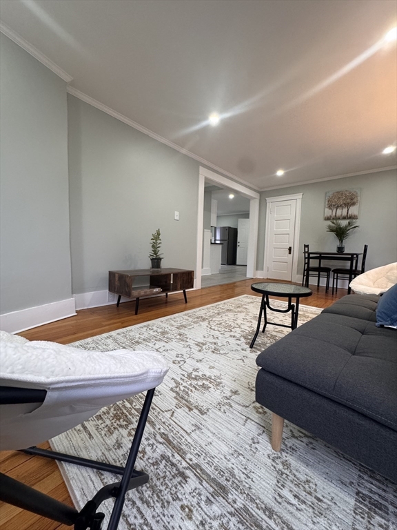 18 Emerald Avenue, Unit 2 Webster, MA 01570 - Photo 2 of 26 a outdoor space with a table and chairs