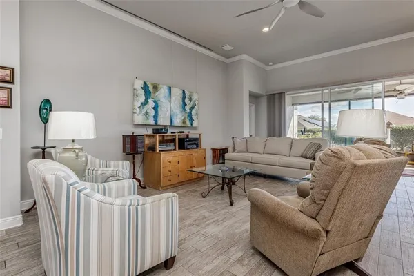a living room with furniture and a window