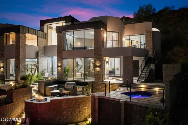 a kitchen with a table and chairs in it