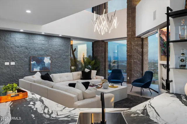 a view of staircase with white walls and a window