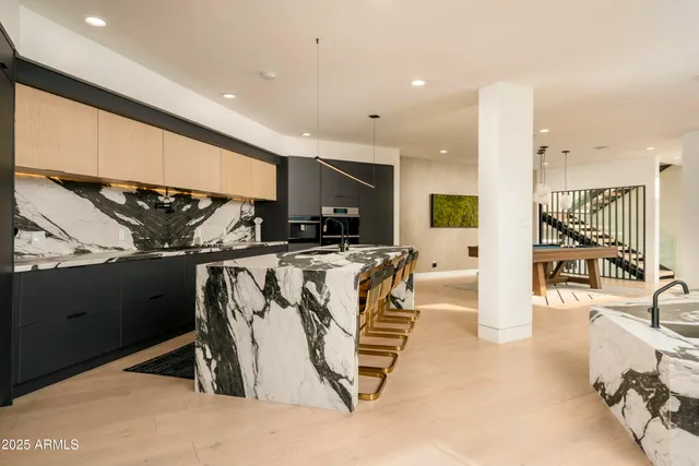 a view of a living room and a floor to ceiling window